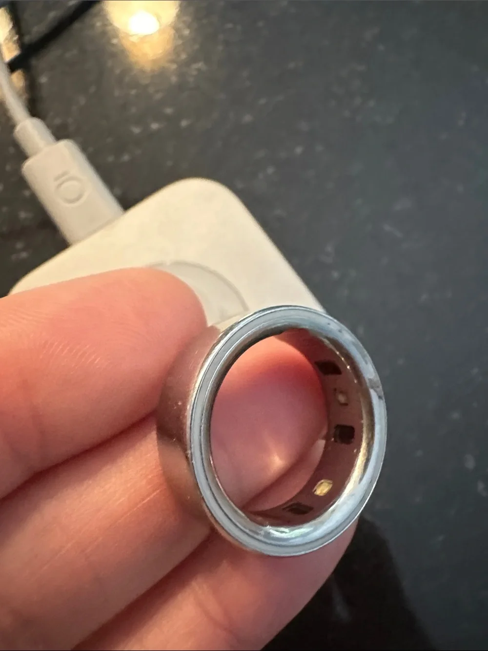 Oura Silver Charging Dock with silver ring